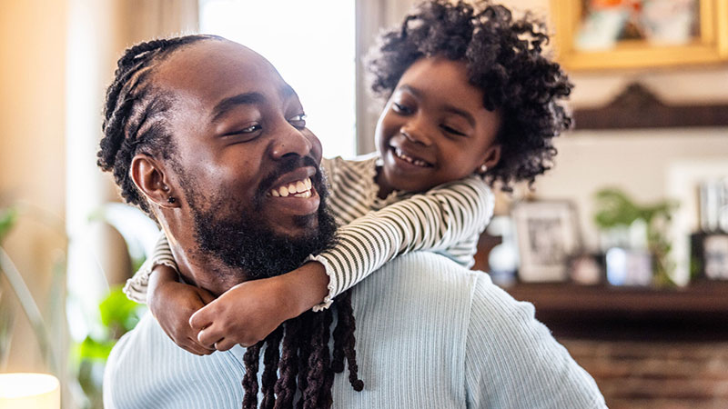 Father and son playing together