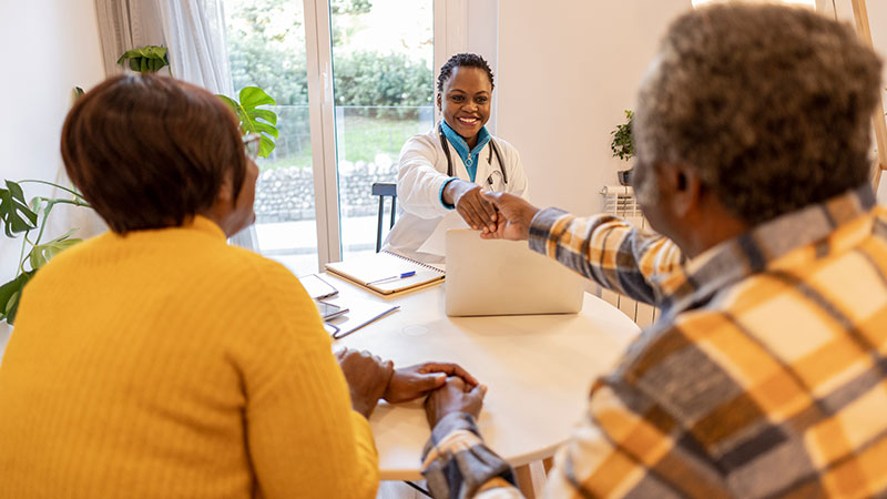 Couple meeting with a doctor